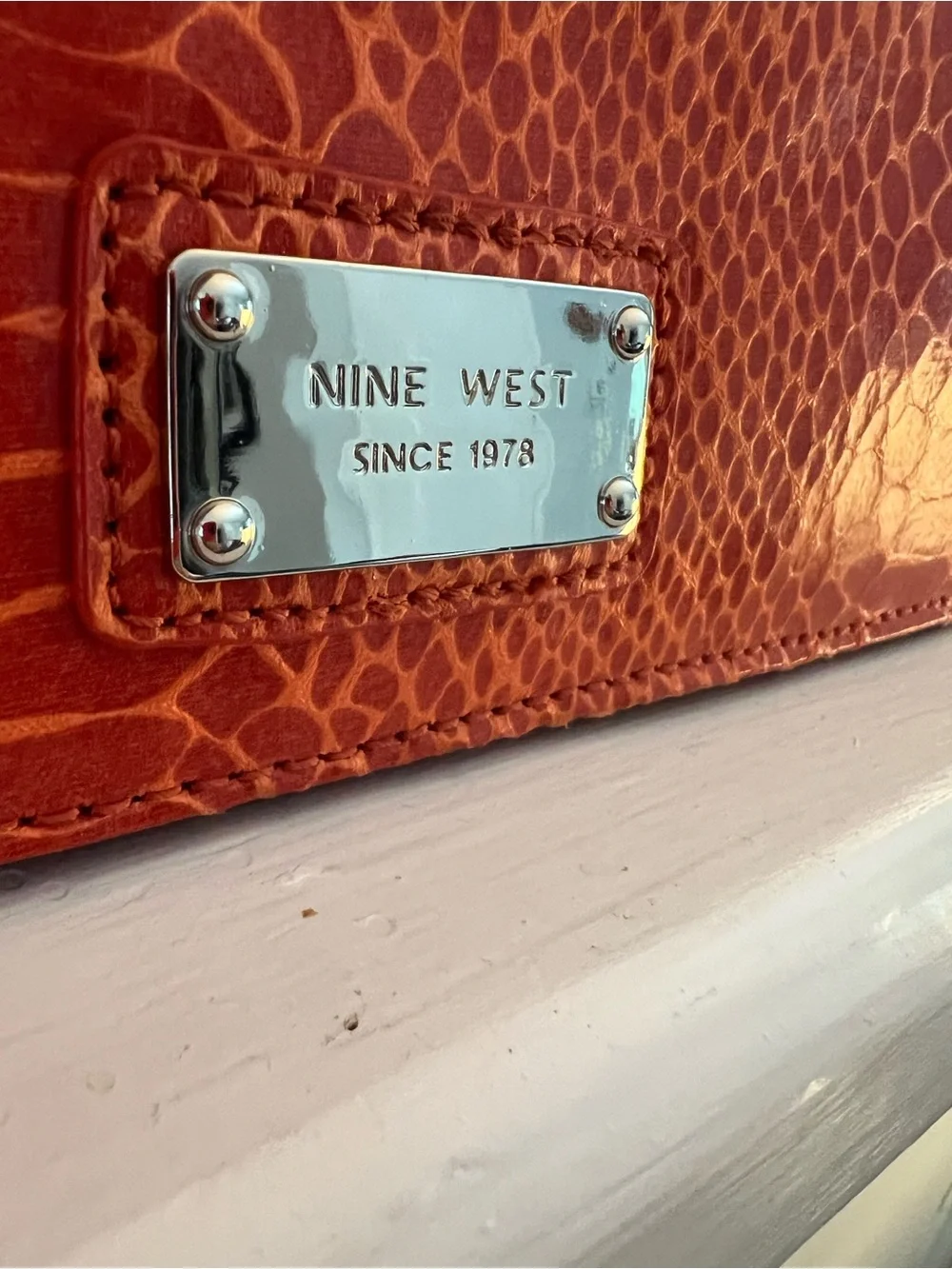 Nine West Orange Textured Bow Clutch